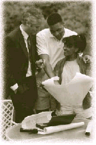 Picture of three people looking at blueprints